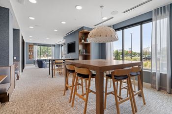 Coworking lounge with private meeting spaces